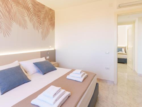 Postel nebo postele na pokoji v ubytování Casa Fiore Plus Appartamento Superior