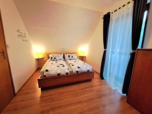 Postel nebo postele na pokoji v ubytování Apartment Erika