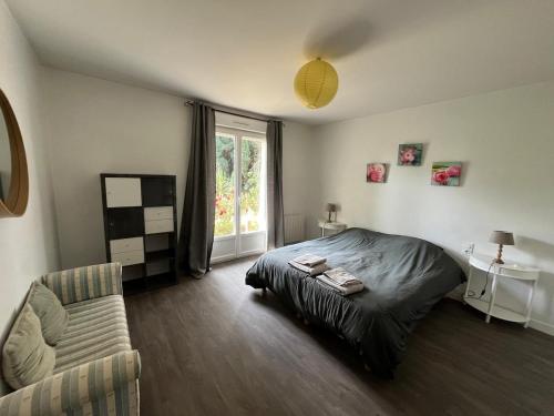 Postel nebo postele na pokoji v ubytování Maison à la campagne