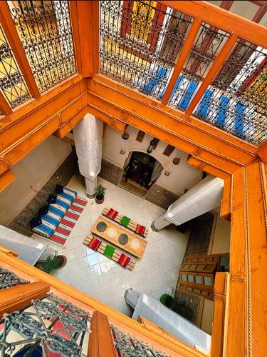 an overhead view of a living room with a table at Riad Ayoub Fes in Fès