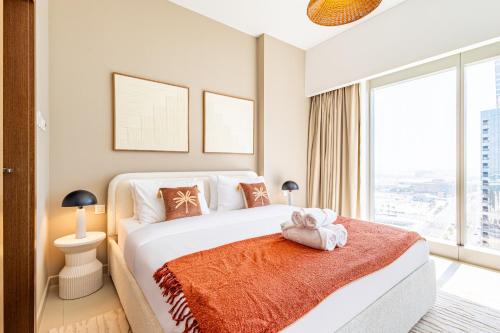 Ένα ή περισσότερα κρεβάτια σε δωμάτιο στο Premium Elegant Studio - The Best Amenities in Reem Island - Paddle - 3 min Walk to the Beach - Designer's Choice - The Arc Tower