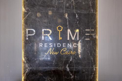 a sign for a new caviar bottle on a wall at Prime Residence New Cairo in Cairo
