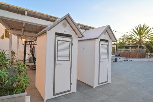 a couple of portable toilets sitting on a patio at Av Club Terme Colella in Ischia