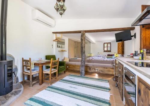 Postel nebo postele na pokoji v ubytování Cortijo de Amor