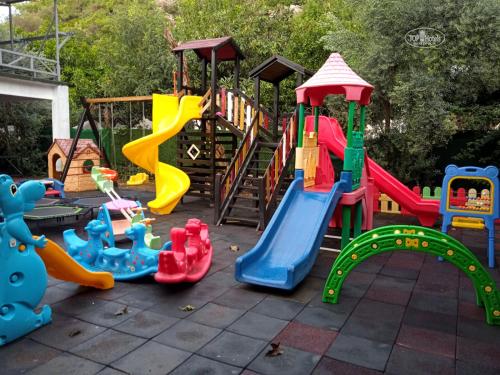 a playground with many different types of play equipment at Mir'Amor Hotel -All Inclusive Plus in Antalya