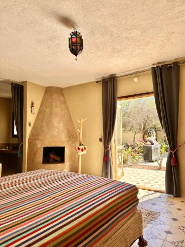 Ένα ή περισσότερα κρεβάτια σε δωμάτιο στο Riad Maj Nia House