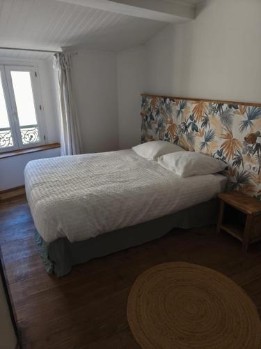 Maison au pied de la cité médiévale
