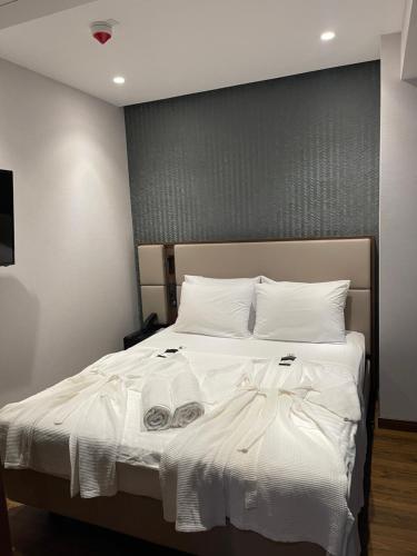 Ένα ή περισσότερα κρεβάτια σε δωμάτιο στο Marriot by Batumi