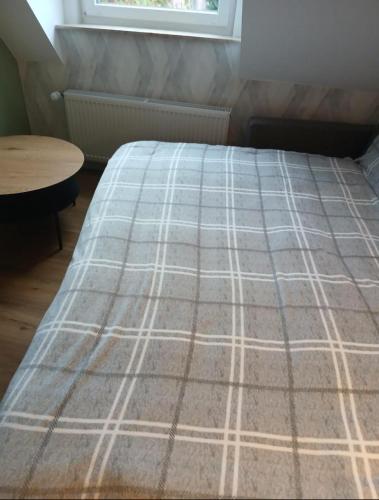 Postel nebo postele na pokoji v ubytování GW Apartment 1