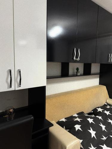 Kuchyň nebo kuchyňský kout v ubytování Apartman TADEJ