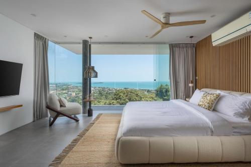 Ένα ή περισσότερα κρεβάτια σε δωμάτιο στο Luxury 6BR Villa Vie