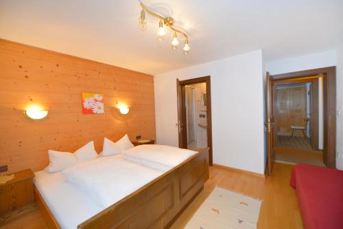 Кровать или кровати в номере Ferienwohnung am Bauernhof