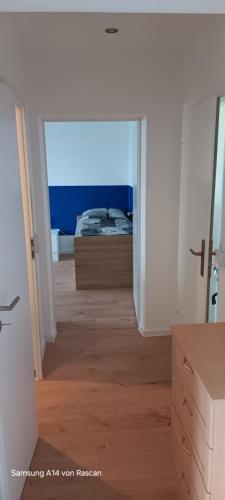 a room with a bedroom with a bed in it at Wohnung Mia in Sangerhausen