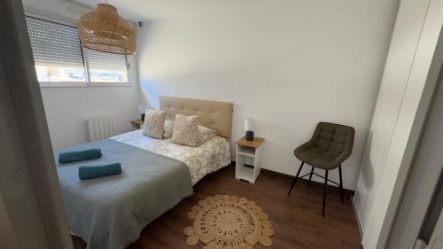 Ένα ή περισσότερα κρεβάτια σε δωμάτιο στο Splendide Appart’ près de Disney