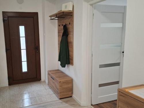 a room with a closet with a door at Apartmán pri Gaderskej bráne in Blatnica