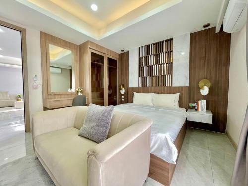 Ένα ή περισσότερα κρεβάτια σε δωμάτιο στο Facai 5 Bed - C26
