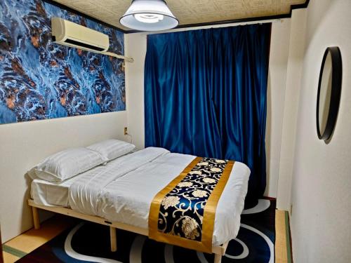 Postel nebo postele na pokoji v ubytování Mito House up to 22 Pax Free Breakfast