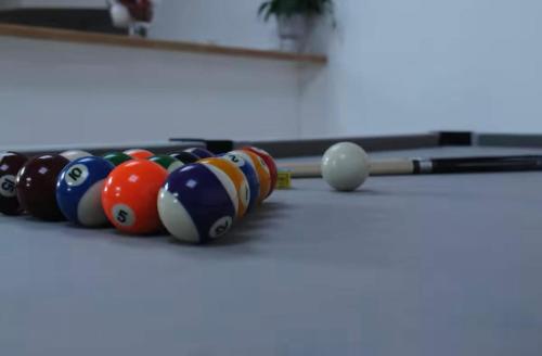 a group of billiard balls on a pool table at Appartement- cœur de Cannes in Cannes