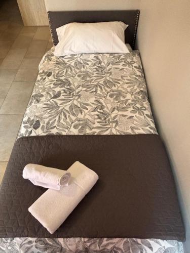 Postel nebo postele na pokoji v ubytování Hôtel du vieux pont