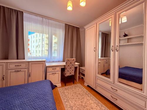 Una cama o camas en una habitación de Apartment Kadriorg, Tallinn