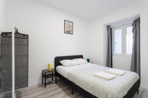 Postel nebo postele na pokoji v ubytování Casa da Travessa