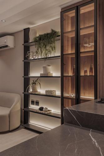 a room with a shelf with items on it at Modern & Elegant Loft in El Poblado in Medellín