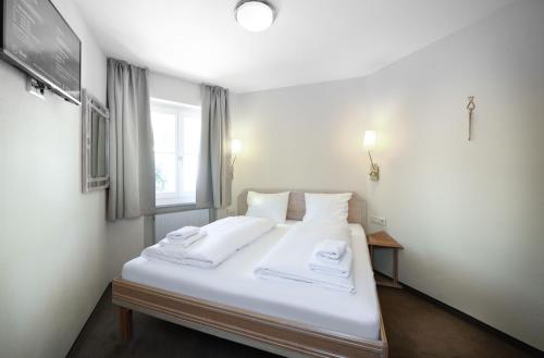 Crystls Aparthotelにあるベッド