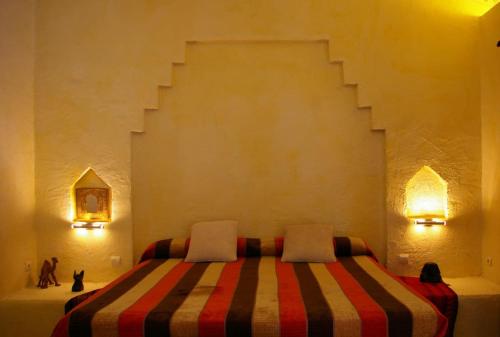 Ένα ή περισσότερα κρεβάτια σε δωμάτιο στο La PuertaMora