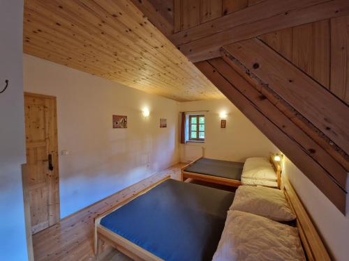 Postel nebo postele na pokoji v ubytování Chalupa pod strání - Olešnice v Orlických horách