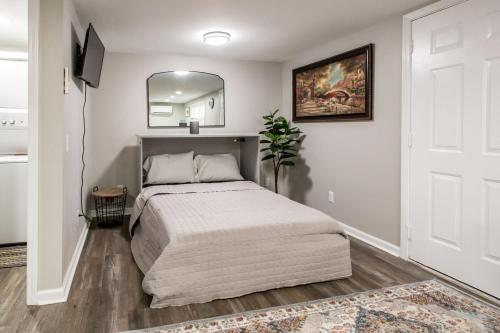 Ένα ή περισσότερα κρεβάτια σε δωμάτιο στο The Cozy Cottage