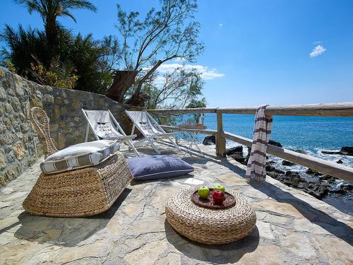 A porch or other outdoor area at Beachfront Villas on Crete - Pelagaios