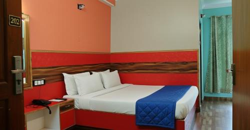 Hotel Tirupati Inn Hill Viewにあるベッド