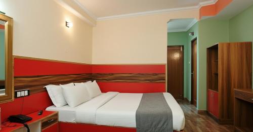 Hotel Tirupati Inn Hill Viewにあるベッド