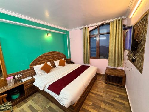 Hotel Tirupati Inn Hill Viewにあるベッド