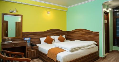Hotel Tirupati Inn Hill Viewにあるベッド