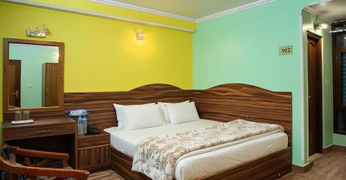 Hotel Tirupati Inn Hill Viewにあるベッド