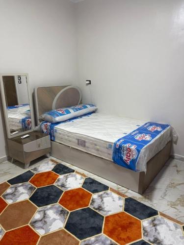 Llit o llits en una habitació de Marco inn
