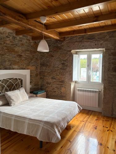 Postel nebo postele na pokoji v ubytování Casa De Don Lino