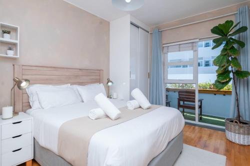 Кровать или кровати в номере Stylish Seaside living at Bay Point