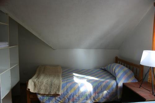Postel nebo postele na pokoji v ubytování Newendo Pucón
