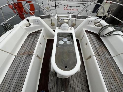 a boat with a toilet in the middle of it at Bião boat Apartment in Vila do Conde