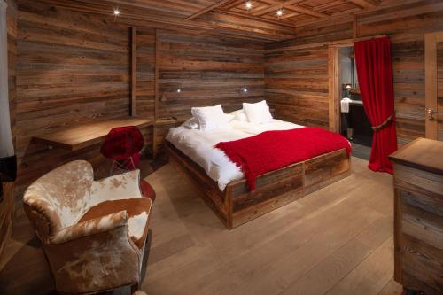Postel nebo postele na pokoji v ubytování Hostellerie du Pas de l'Ours "Relais et Châteaux"