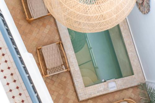 an overhead view of a shower in a bathroom at Riad La Kasbah secrète in Marrakech