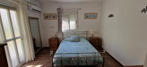 Postel nebo postele na pokoji v ubytování Casa Hilton