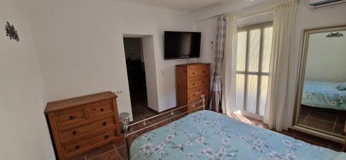 Postel nebo postele na pokoji v ubytování Casa Hilton