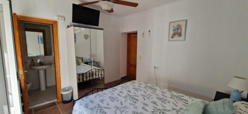 Postel nebo postele na pokoji v ubytování Casa Hilton