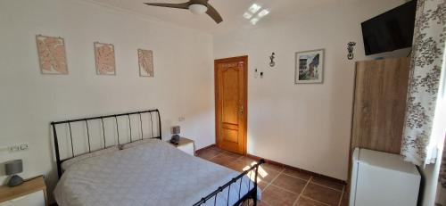 Postel nebo postele na pokoji v ubytování Casa Hilton