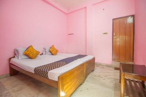 Postel nebo postele na pokoji v ubytování Hotel O Greenwood