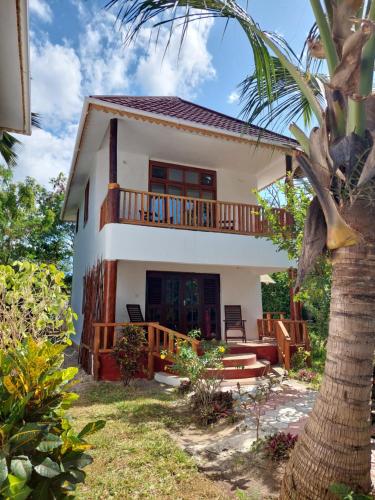 Κήπος έξω από το Queen of Sheba Beach Lodge