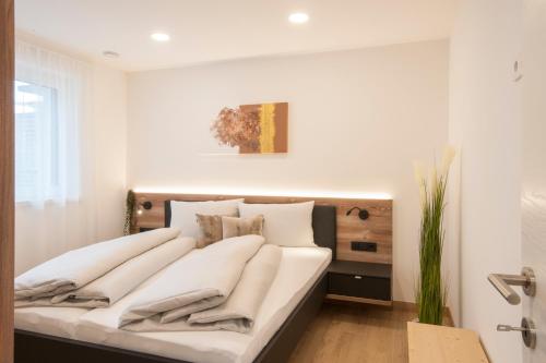 Una cama o camas en una habitación de Armea Appart